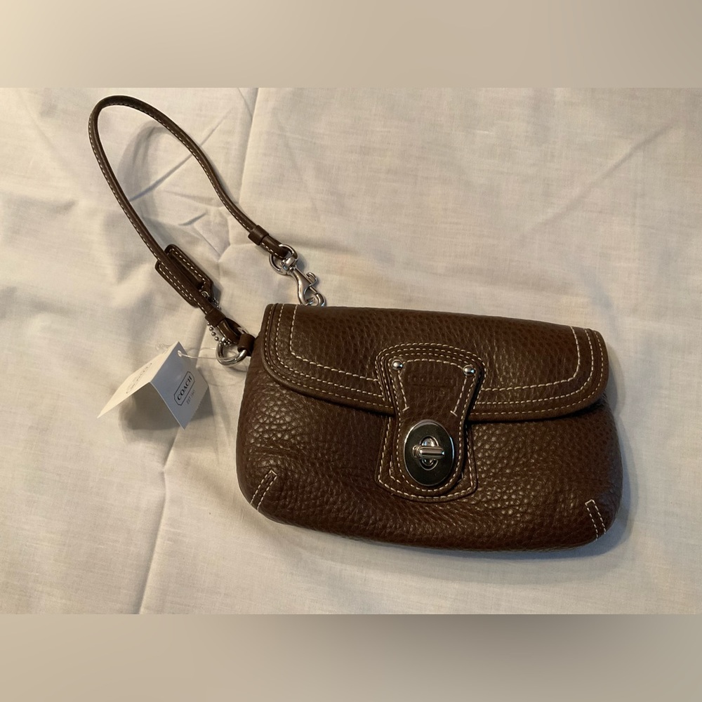 Coach brown leather wristlet.